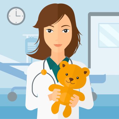 Çocuk doktoru holding oyuncak ayı.
