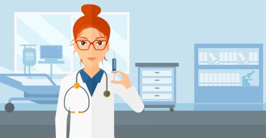 Doktor hastane koğuşunda şırınga.