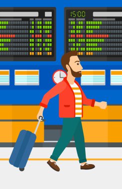 bavulla yürüyen adam.