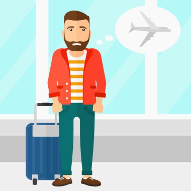 Adam gelecek uçuş tarafından korkmuş.