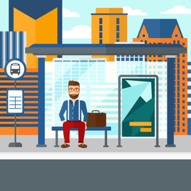 Otobüs bekleyen adam.