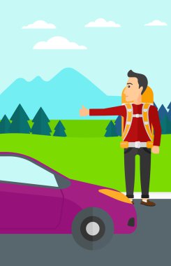 Genç adam otostop çekiyor..