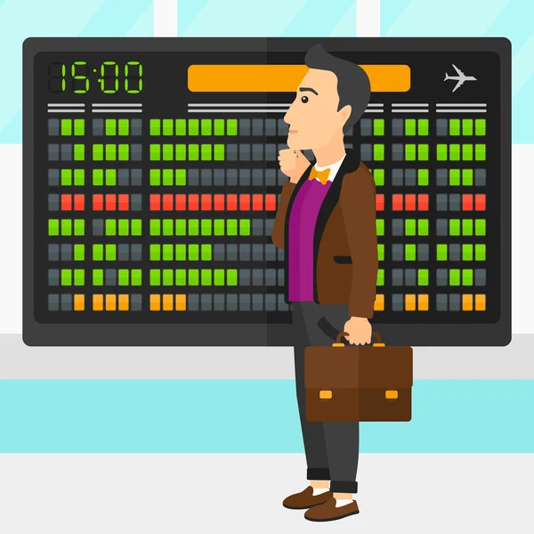 Hombre mirando el tablero de programación . — Vector de stock