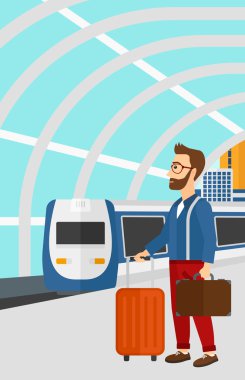 Man with suitcase on wheels and briefcase.
