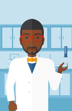 Doctor with syringe in laboratory.