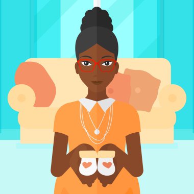 hamile kadınla Bebek Patiği.