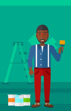 Boya fırçası ile ressam.