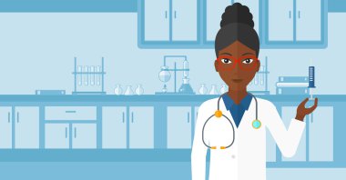 Doctor with syringe in laboratory.