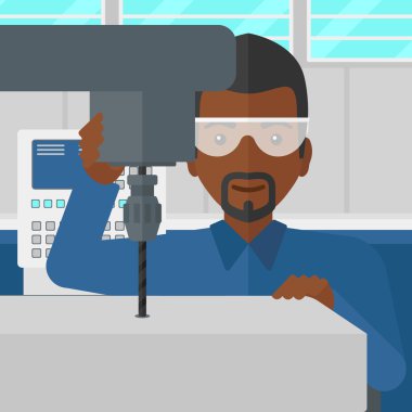 Sıkıcı ile çalışan erkeğin değirmen.