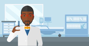 Doktor hastane koğuşunda şırınga.