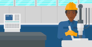 Endüstri/sanayii donatımı ile çalışan adam.