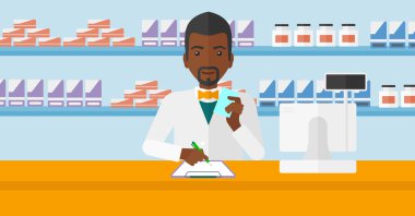 Pharmacist taking notes.