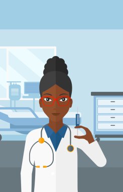 Doktor hastane koğuşunda şırınga.