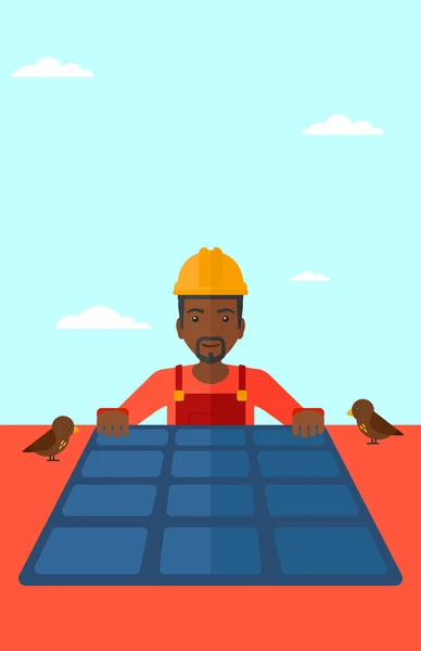 Constructor met zonnepaneel. — Stockvector