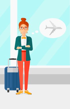 Kadın gelecek uçuş tarafından korkmuş.