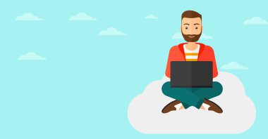 Dizüstü bilgisayarda çalışan adam.