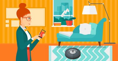 Woman with robot vacuum cleaner.