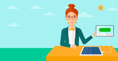 Solar panel charging tablet computer.