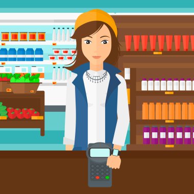 Woman paying with smart watch.