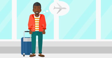 Adam gelecek uçuş tarafından korkmuş.