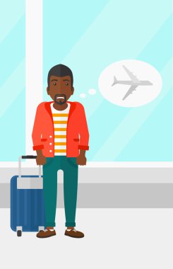 Adam gelecek uçuş tarafından korkmuş.