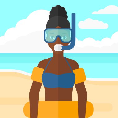 Woman with swimming equipment.