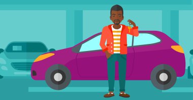 Yeni araba anahtarını tutan adam.