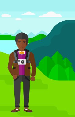 Man with camera on chest.