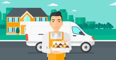 Baker 'ın elinde bir kutu pasta..