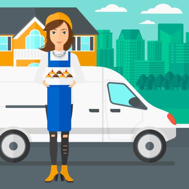 Baker 'ın elinde bir kutu pasta..