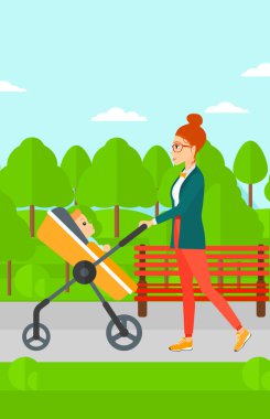 kadın iterek çocuk arabası.