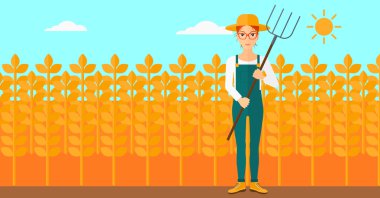 Çiftçi dirgen ile.