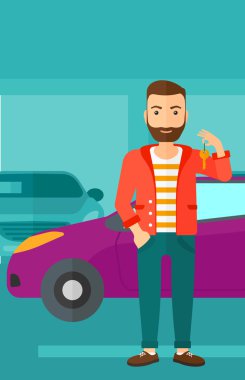 Adamın elinde yeni arabanın anahtarları var..