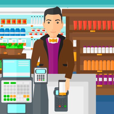 Customer paying with his smartphone using terminal.