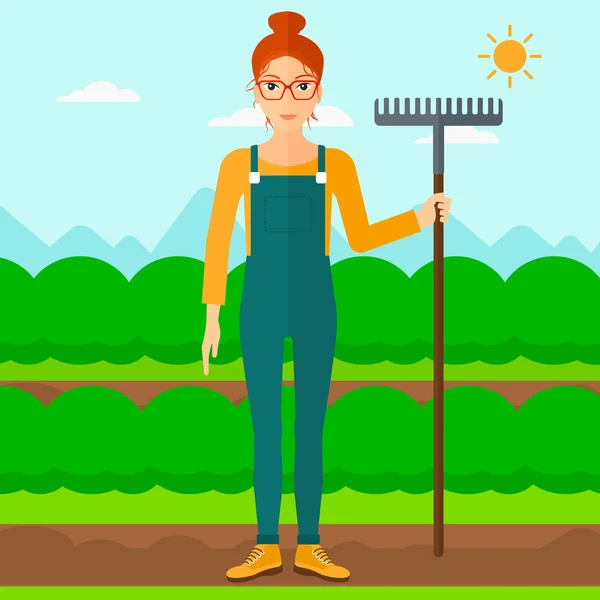Farmer with rake. — Stock Vector