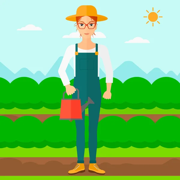 Agricultor con regadera. — Vector de stock