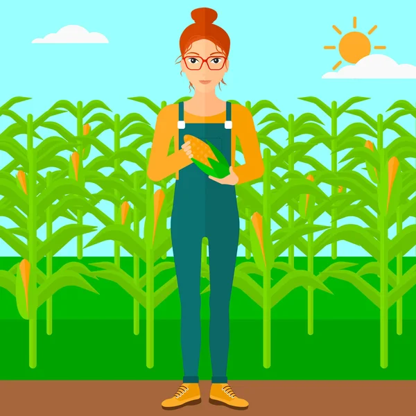 Farmer holding corn. — Stock Vector