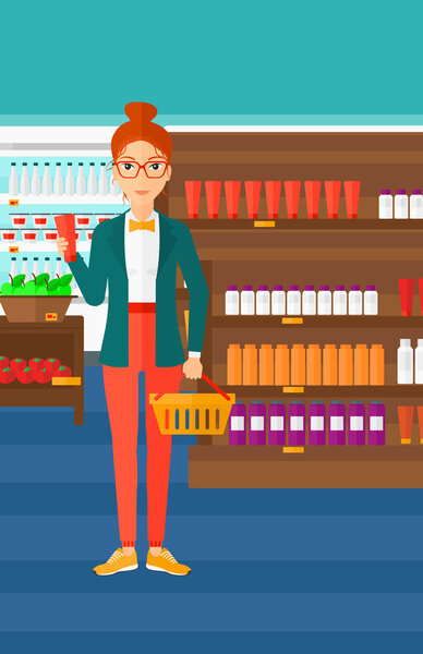 Customer with shopping basket and tube of cream.