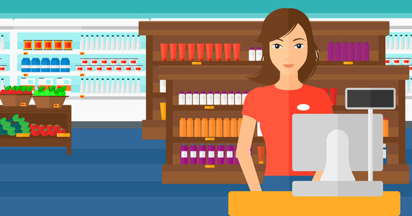 Saleslady standing at checkout.