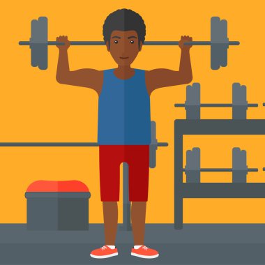 Adam halteri kaldırıyor..