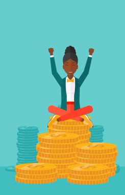 Happy business woman sitting on coins.