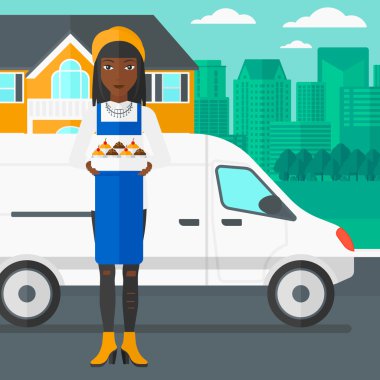 Baker 'ın elinde bir kutu pasta..