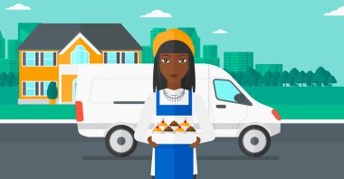 Baker 'ın elinde bir kutu pasta..