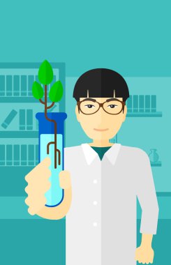 Test tüplü laboratuar asistanı.