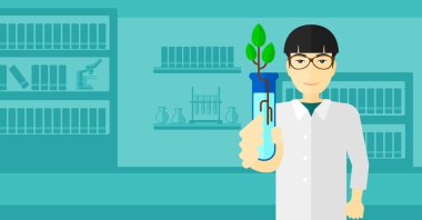 Test tüplü laboratuar asistanı.