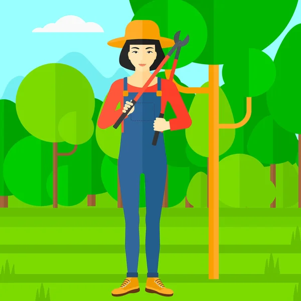 Agriculteur avec taille dans le jardin . — Image vectorielle