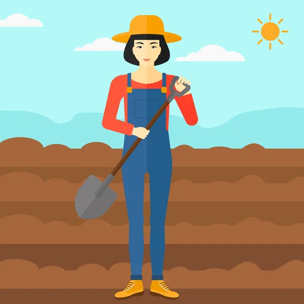 Agricultor en el campo con pala . — Vector de stock