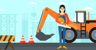 Kask ile mühendis ve blueprint.