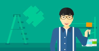 Boya fırçası ile ressam.