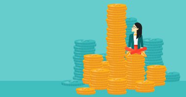 Business woman sitting on gold.